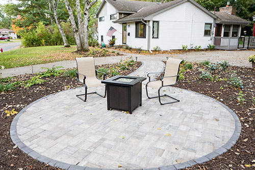 circle patio by Meadowgreen Landscape