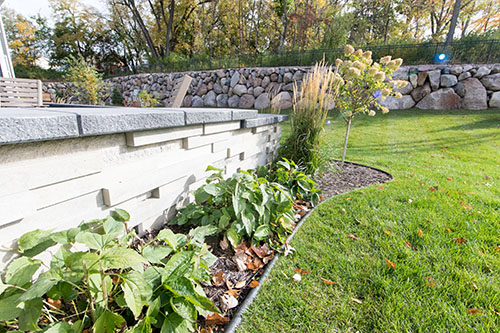 Stone wall construction by Meadowgreen Landscape